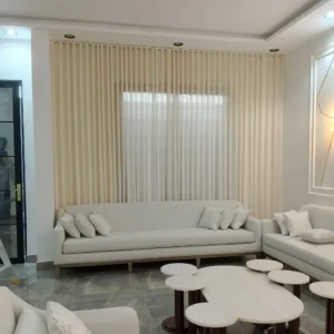 Elegant flowing wave curtains with clean S-folds for modern living rooms and premium interiors